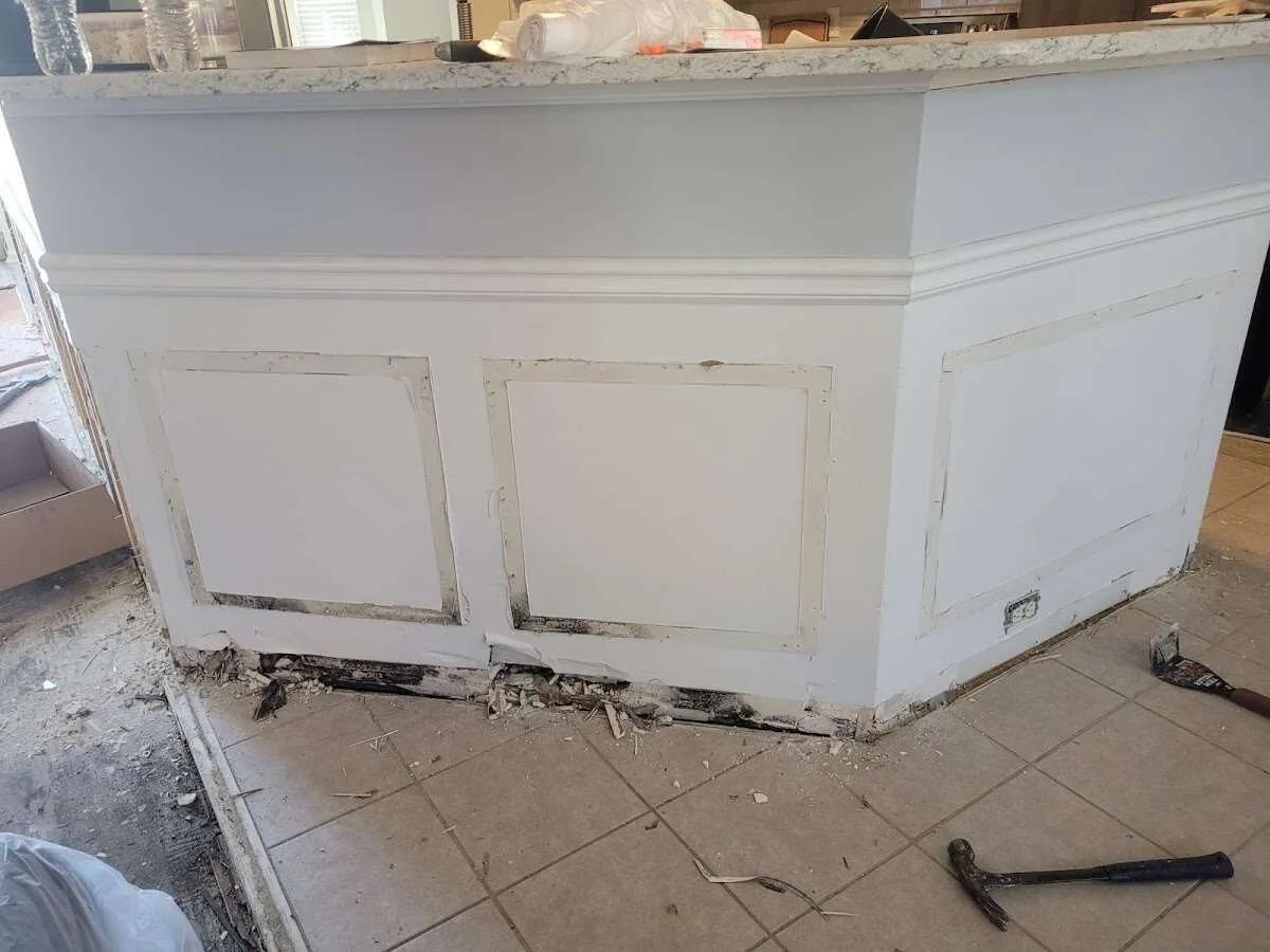 Water damage and mold on kitchen during Storm Damage Restoration in Briarcliff Manor